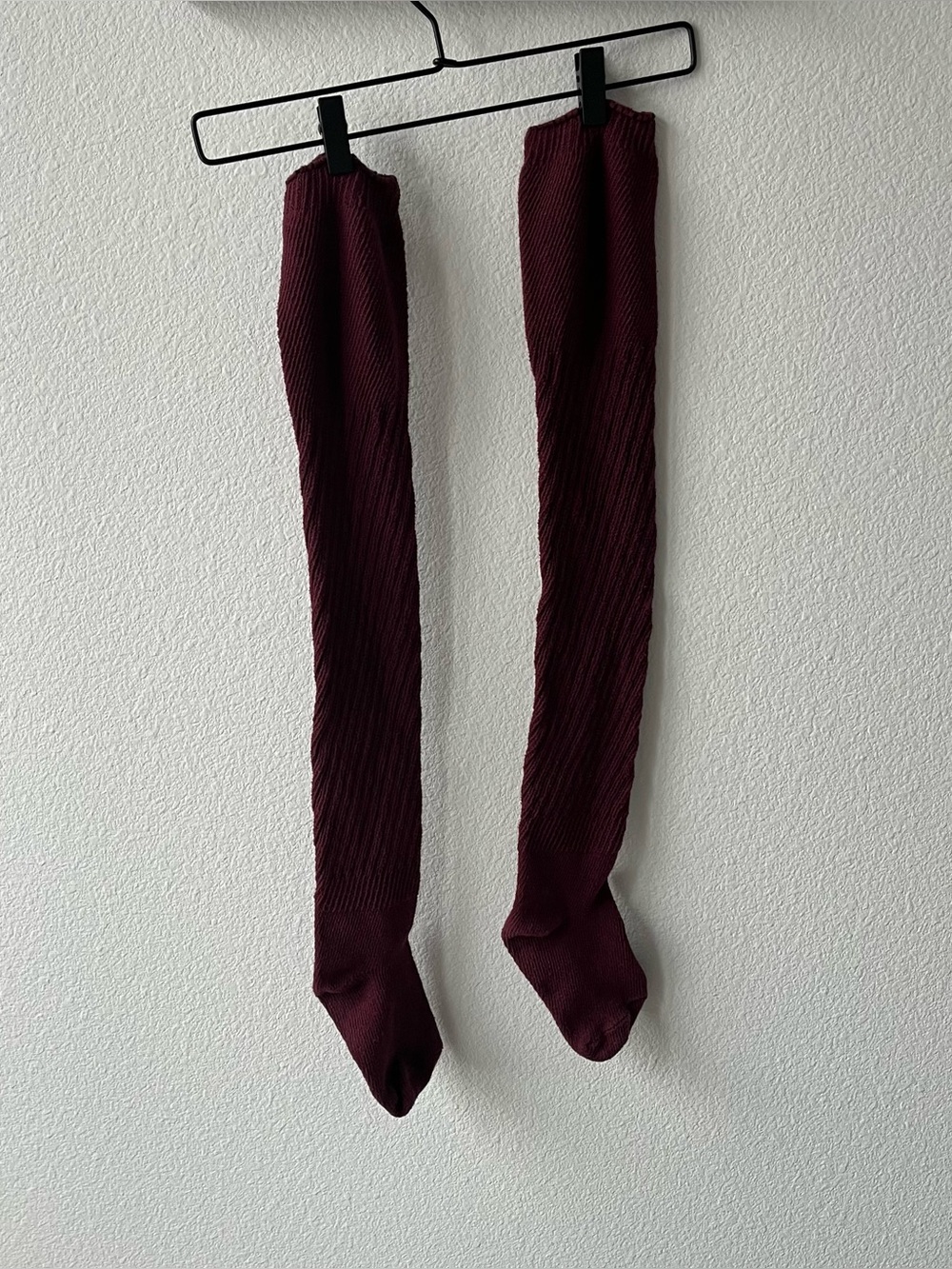 Dark red spiral ribbed thigh high socks